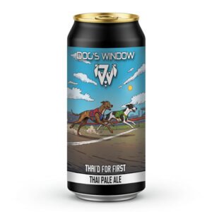 A black beer can with a blue label for Dog's Window Thai'd For First Thai Pale Ale, showing a cartoon illustration of two greyhounds running neck-and-neck across a finish line on a dirt racetrack.